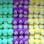 A colorful pile of soft plush toys